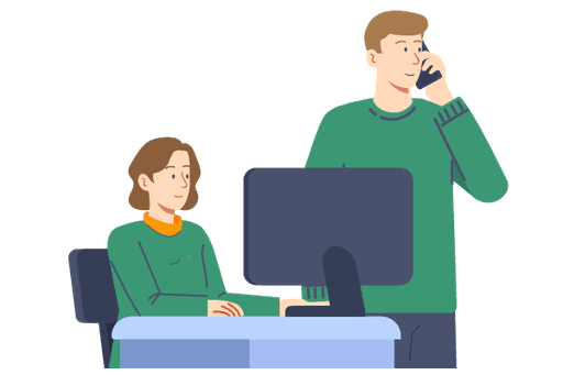 Patientin sitzt am Computer, Patient steht und telefoniert.